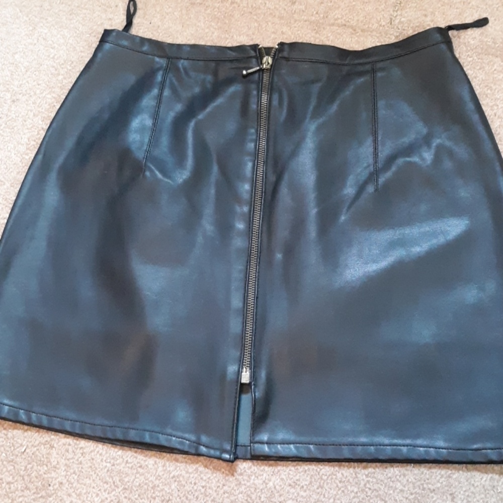 COPY - Faux leather zip front skirt.